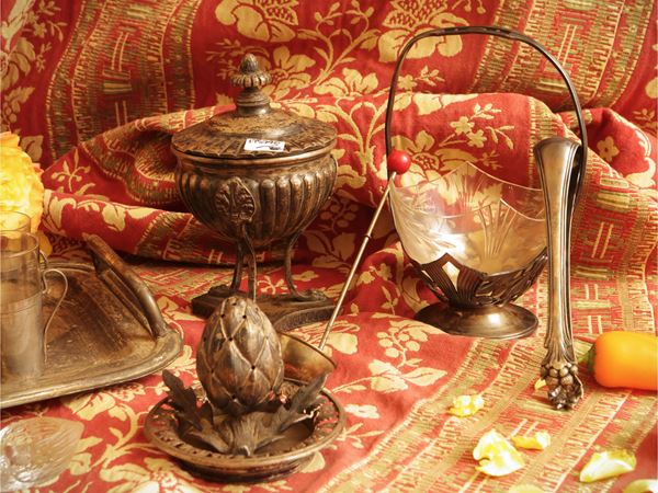 Miscellanea of silver metal table accessories