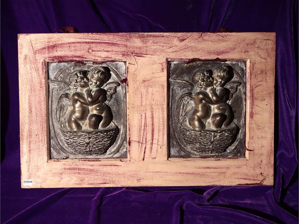 Pair of bronze tiles