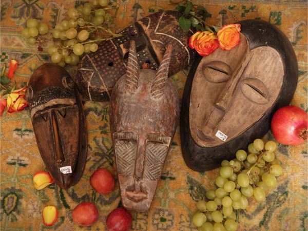 Four wooden tribal masks