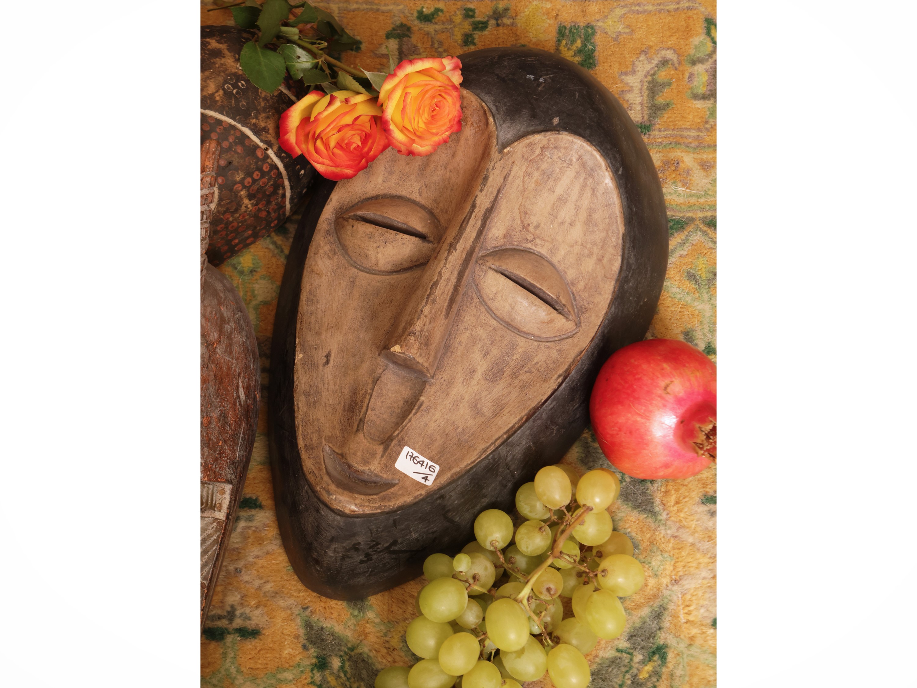 Quattro maschere tribali in legno, dimensioni variabili