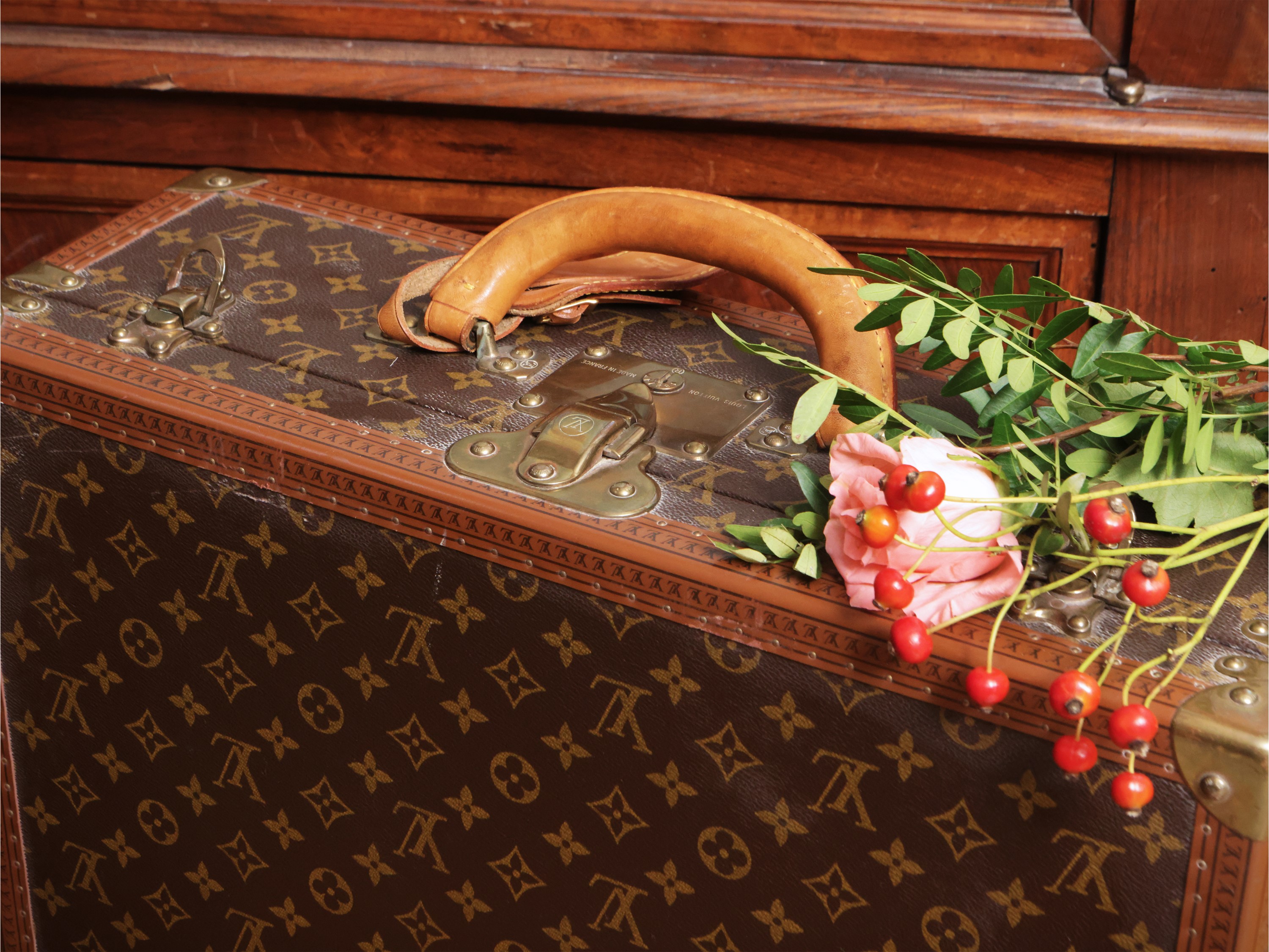 Louis Vuitton, Piccola valigia rigida in tela monogram con dettagli in cuoio e metallo