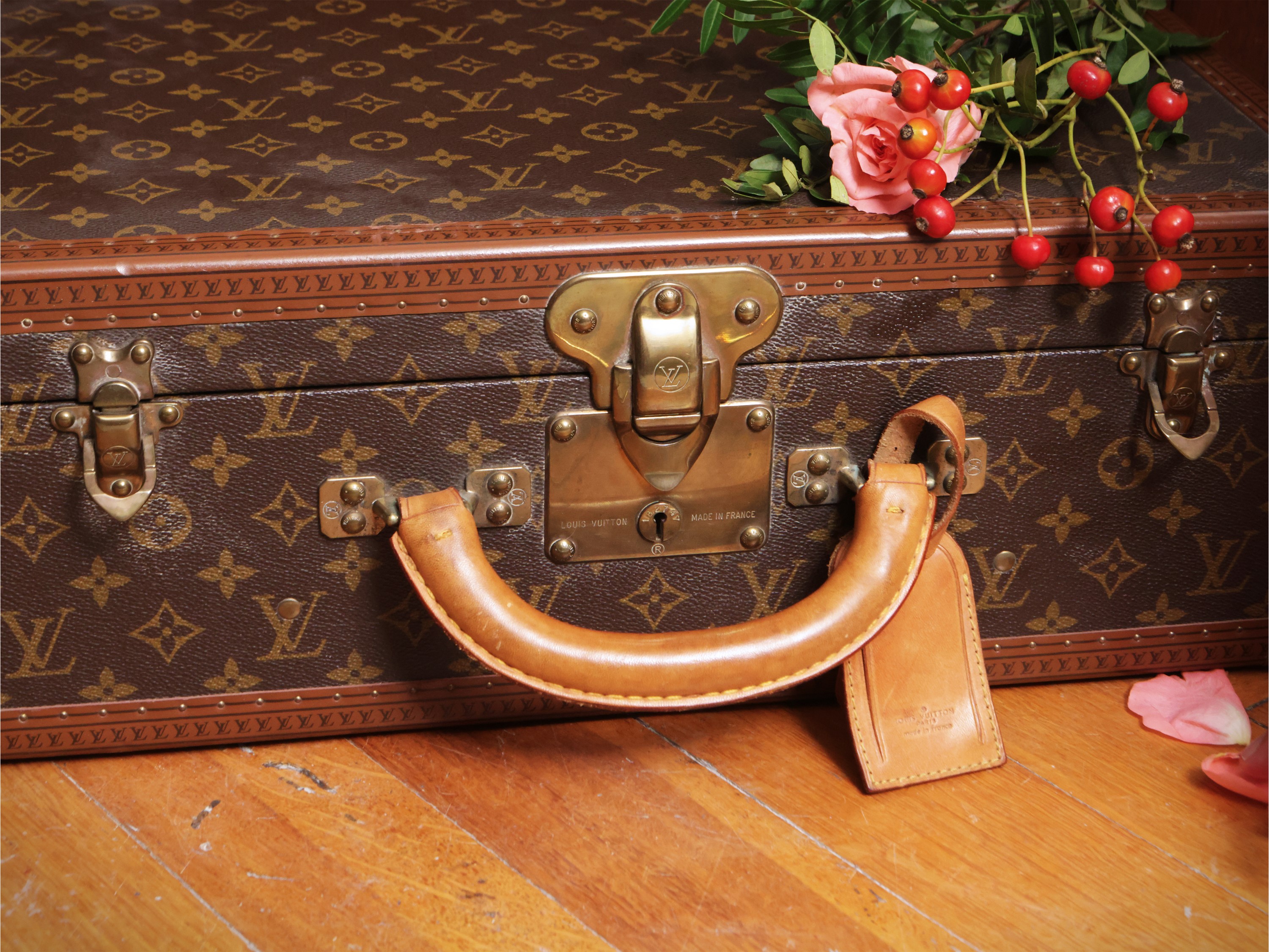 Louis Vuitton, Piccola valigia rigida in tela monogram con dettagli in cuoio e metallo