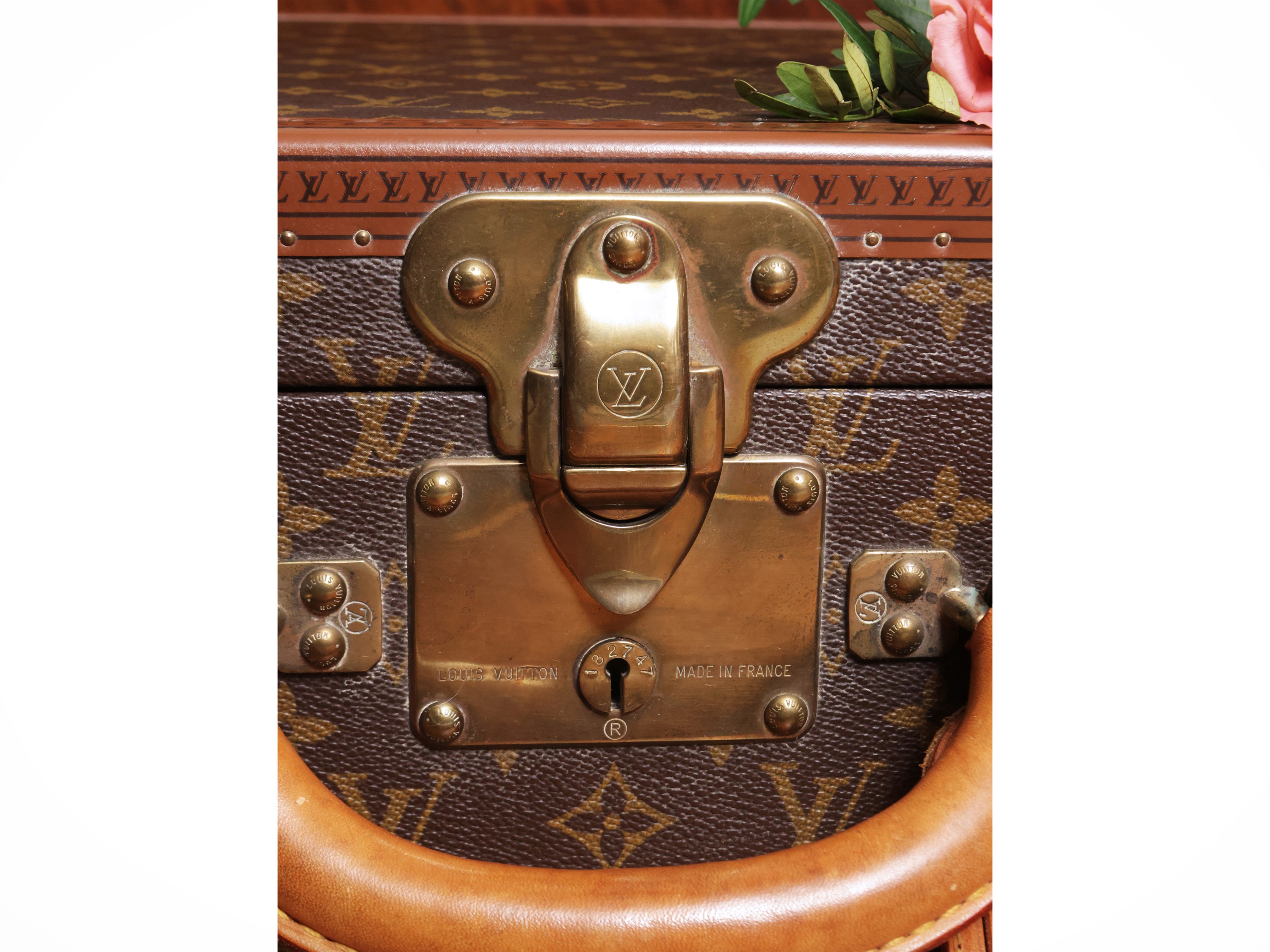 Louis Vuitton, Piccola valigia rigida in tela monogram con dettagli in cuoio e metallo