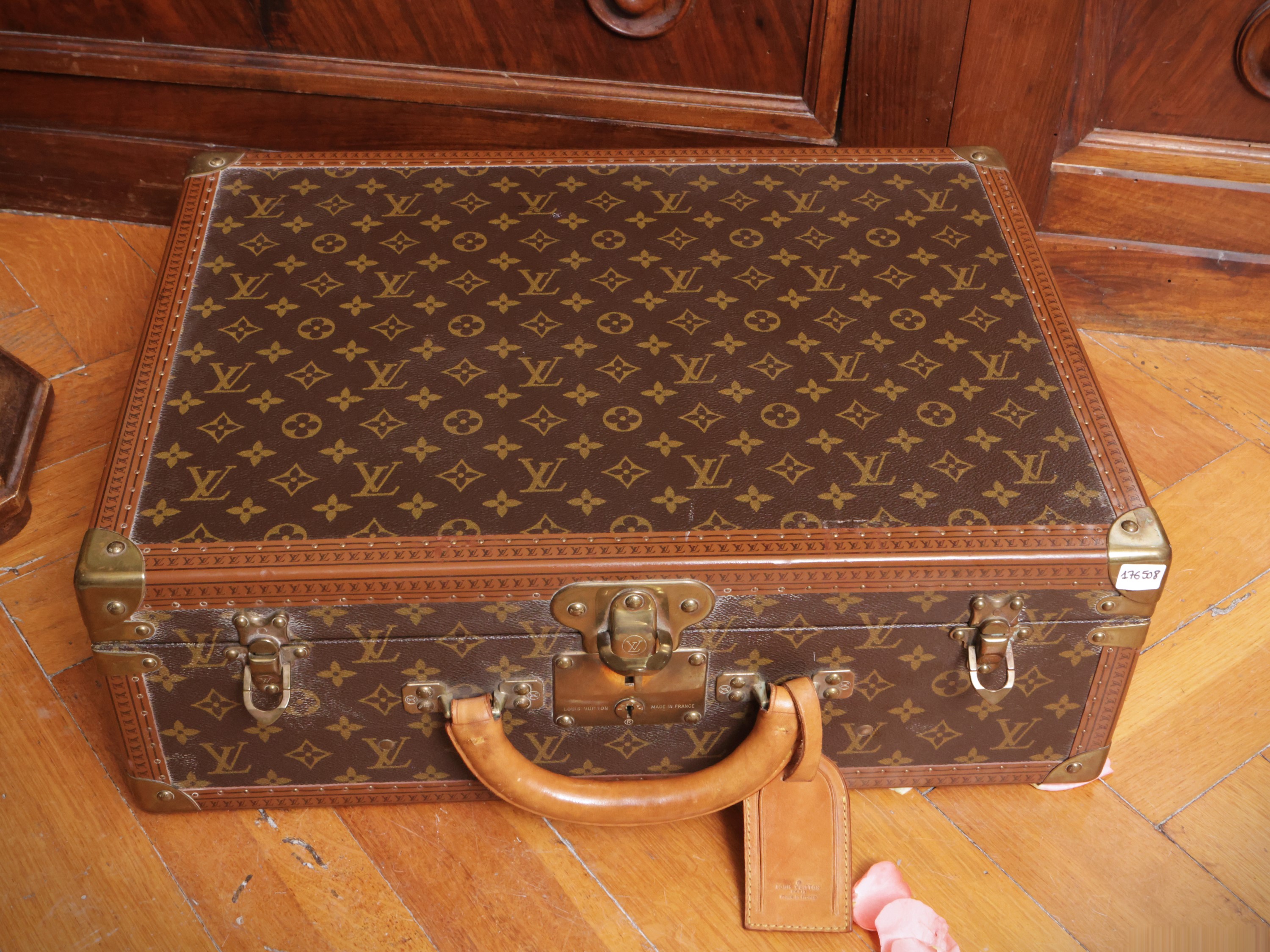 Louis Vuitton, Piccola valigia rigida in tela monogram con dettagli in cuoio e metallo