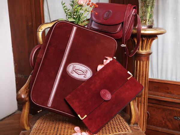 Le Must de Cartier - Three accessories in burgundy suede and leather