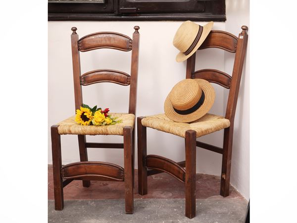 Series of six rustic chairs in walnut