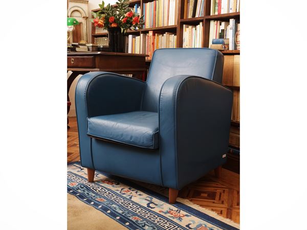 Pair of octal -colored leather armchairs