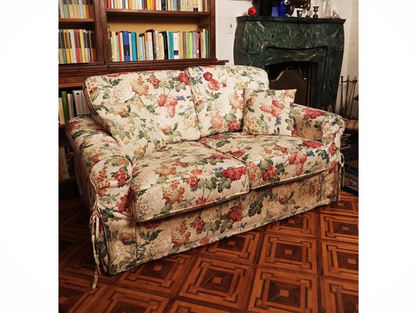 Two -seater padded sofa