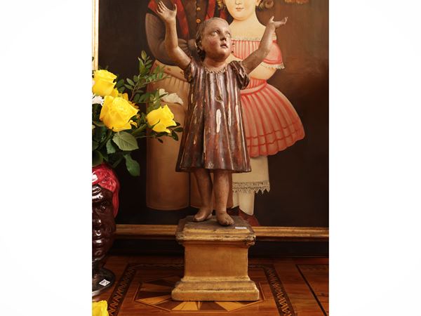 Figure in lacquered and gilded wood