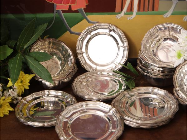 Set of silver metal accessories
