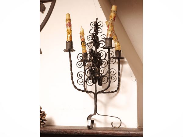 Pair of antique wrought iron candelabra