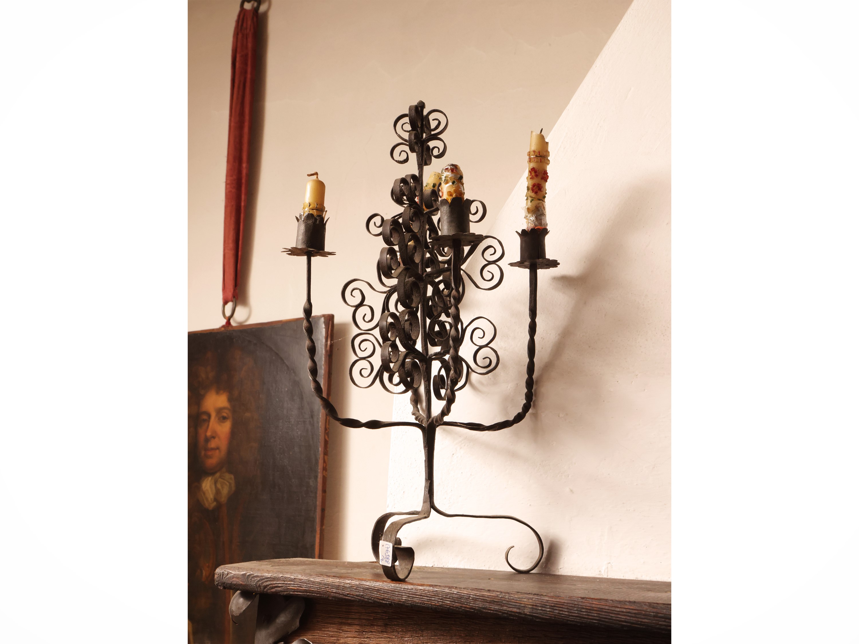 Coppia di candelabri in ferro battuto, XIX secolo