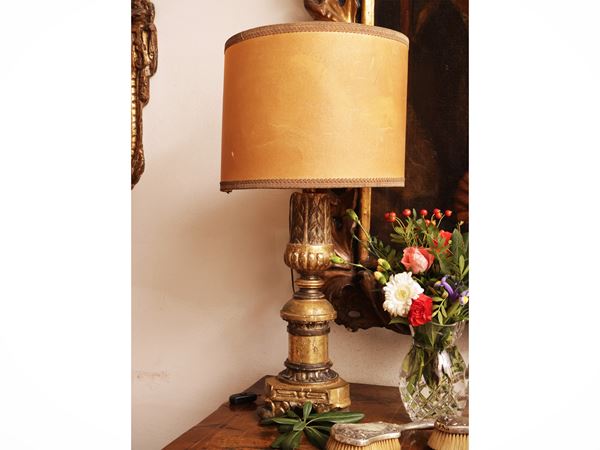 Pair of carved and gilded wooden torch holders