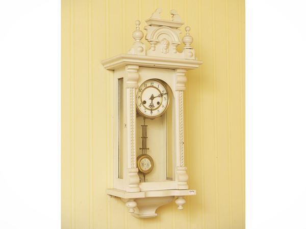 Pendulum wall clock in white stained wood
