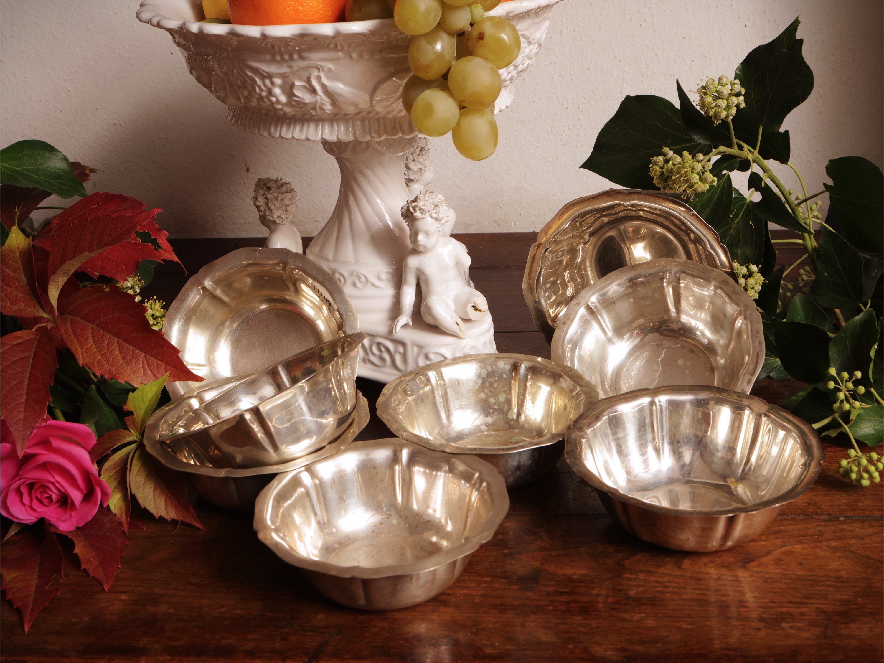 Serie di otto coppette in argento