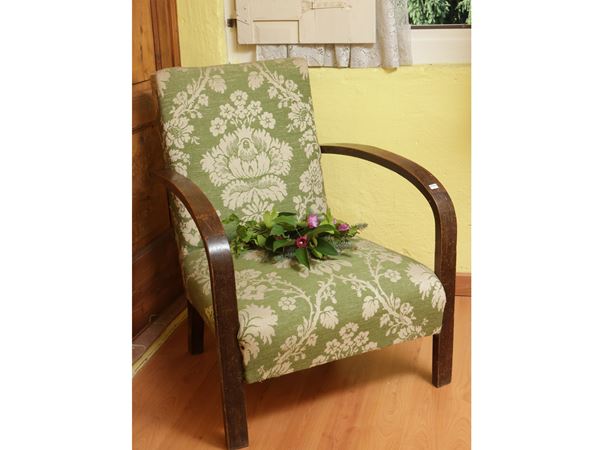 Curved beech armchair