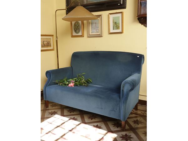 Padded two -seater sofa