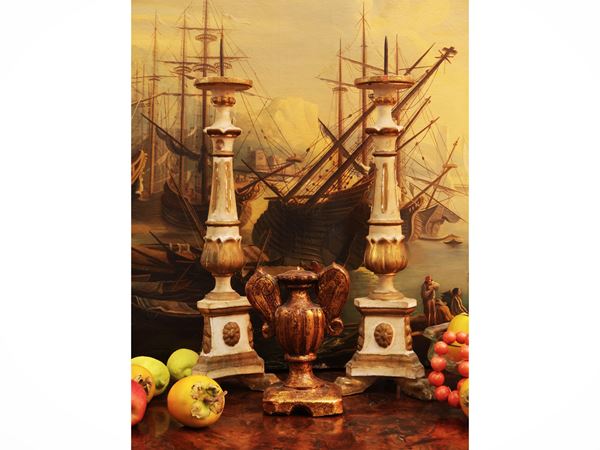 Pair of carved, golden and lacquered wooden torches