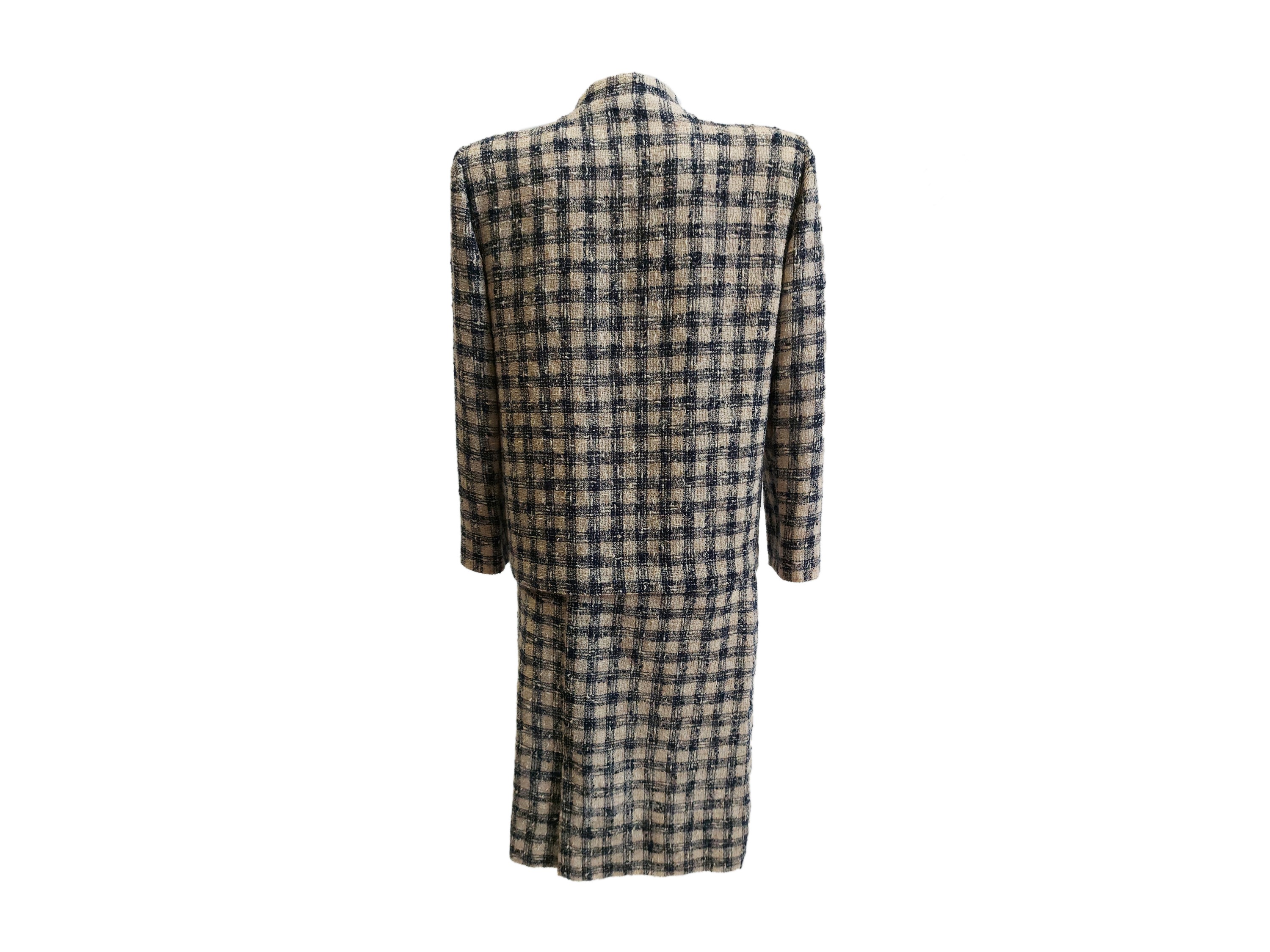 Tailleur sartoriale in tweed bouclé bianco e blu