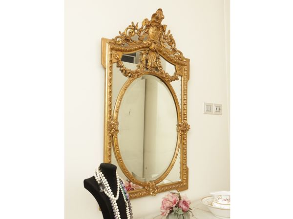 Mirror with carved and gilded wooden frame