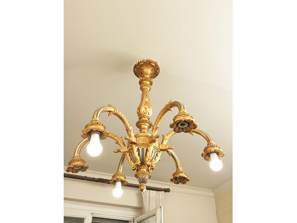 Carved and gilded wooden chandelier