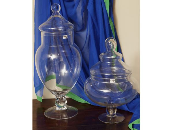 Two large transparent glass containers