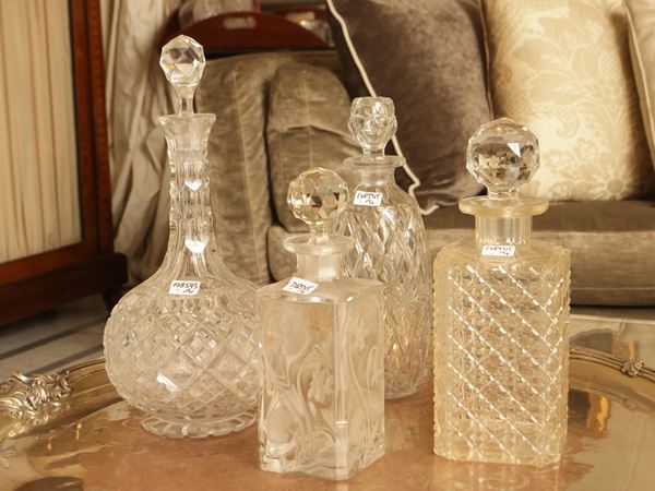 Four cut crystal bottles