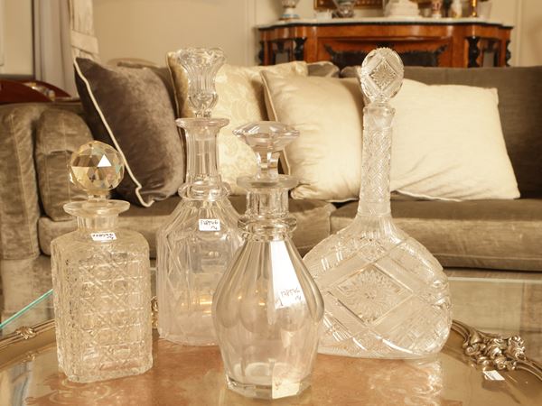 Four cut crystal bottles