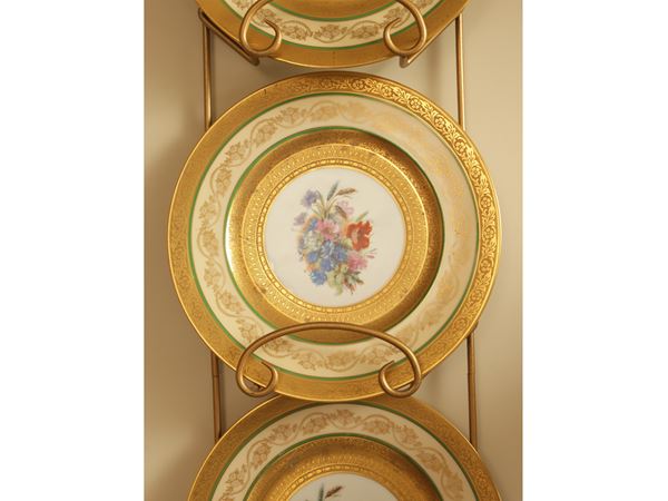 Series of four decorative plates in German porcelain