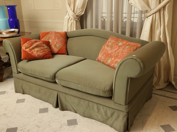 Upholstered two-seater sofa