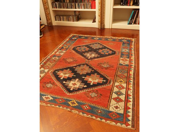 Old-fashioned Caucasian carpet