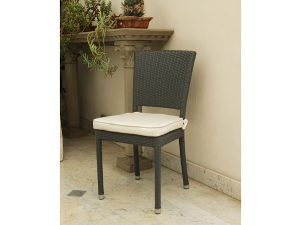 Set of six garden chairs in gray synthetic rattan