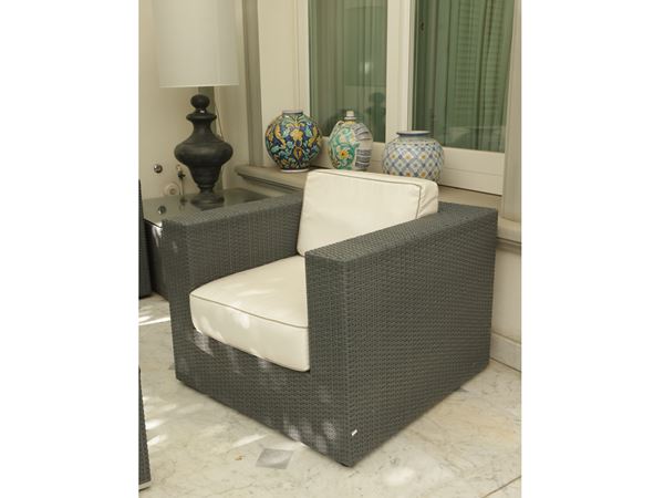 Poltrona a pozzetto in rattan sintetico grigio