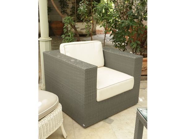 Tub armchair in gray synthetic rattan