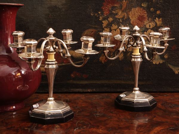 Pair of silver candelabra