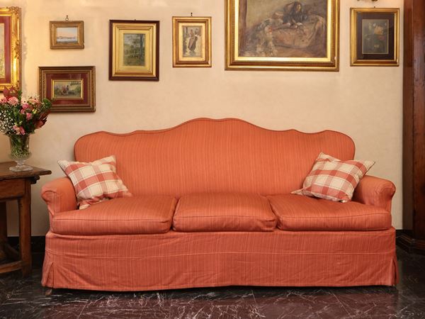 Padded three-seater sofa