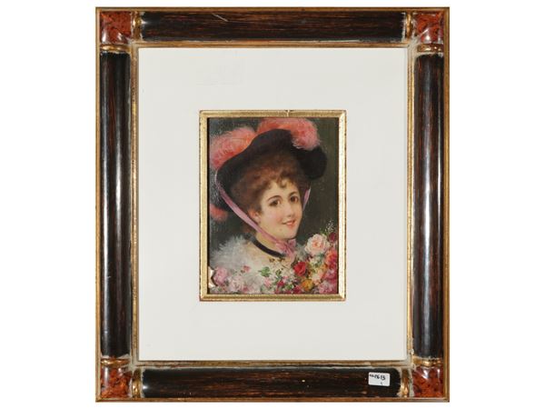 Portrait of woman with hat and bouquet of flowers
