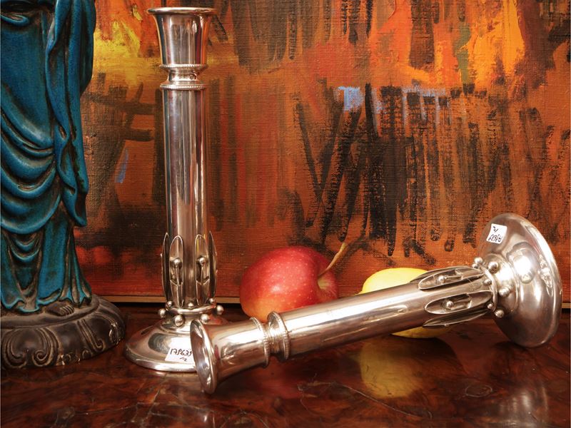 Coppia di candelieri in argento sterling 925