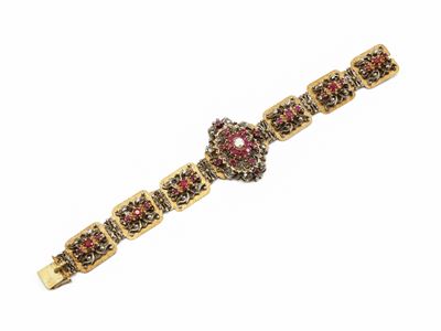 Bracciale anni Sessanta in oro rosa e argento con diamanti e rubini