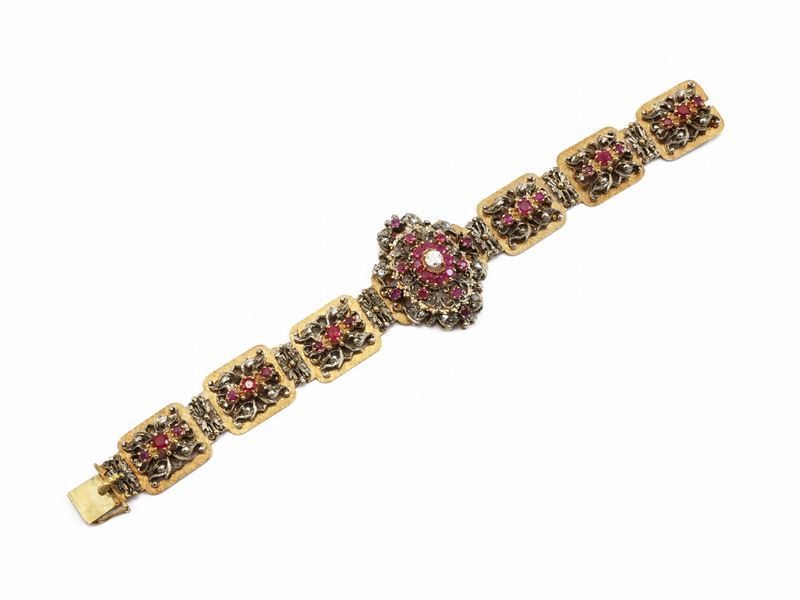 Bracciale anni Sessanta in oro rosa e argento con diamanti e rubini