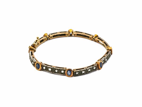 Bracciale segmenti in oro rosso 12 kt e argento con diamanti e zaffiri  (Anni Sessanta)  - Asta Gioielli e Orologi - Maison Bibelot - Casa d'Aste Firenze - Milano