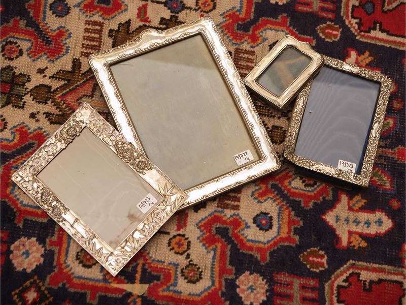 Quattro cornici da collezione rivestite in argento