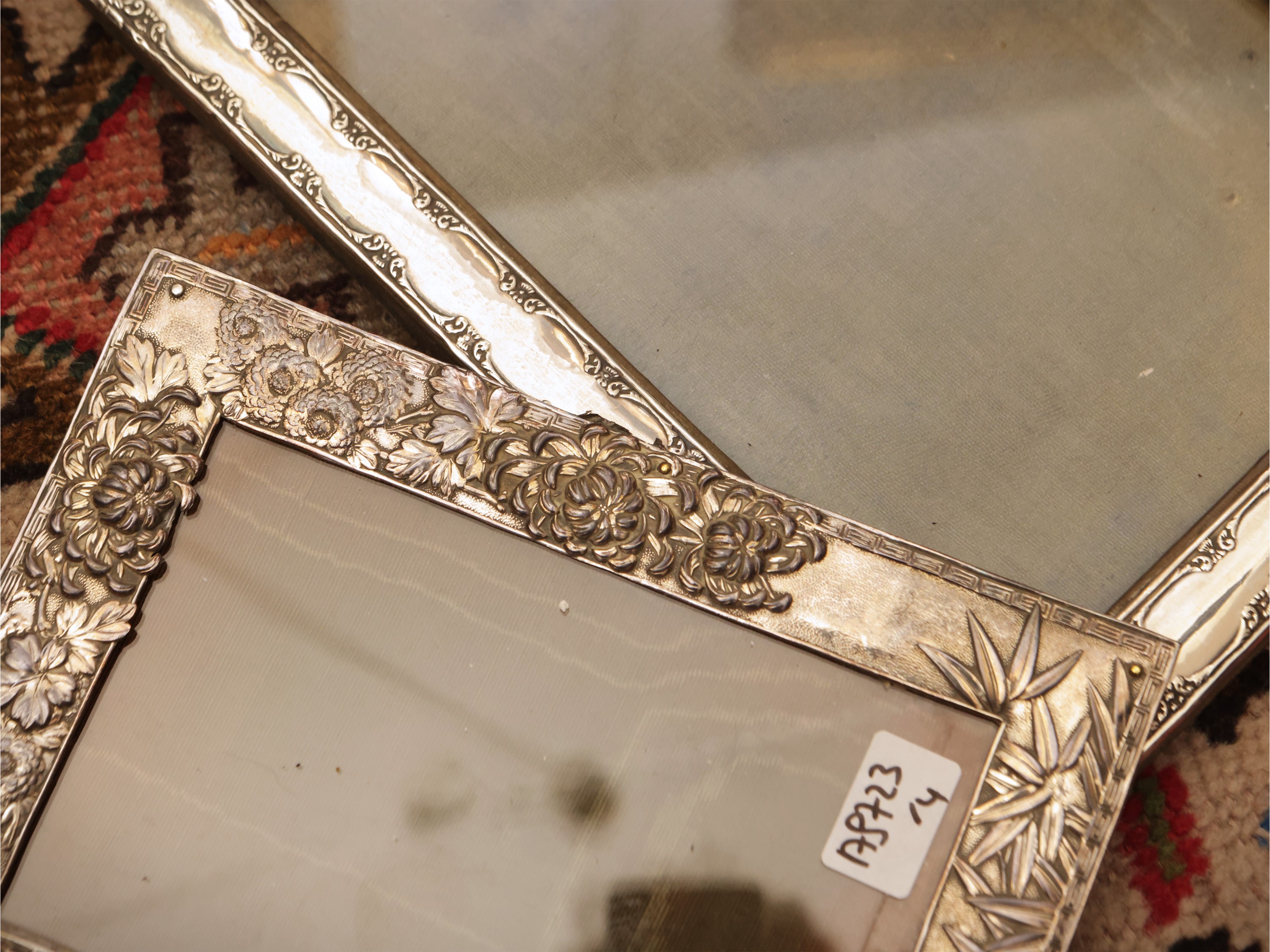 Quattro cornici da collezione rivestite in argento