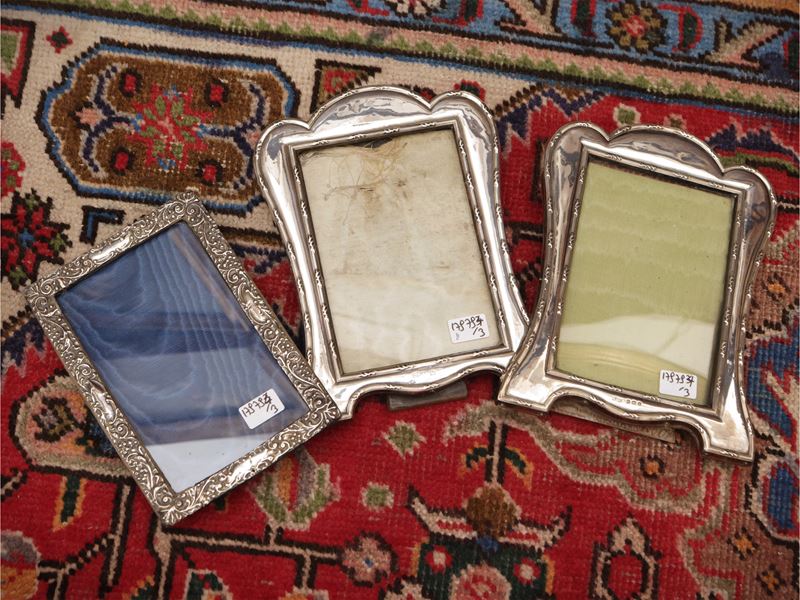Coppia di cornici per fotografie rivestite in argento