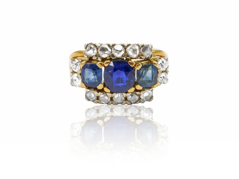 Anello trilogy a fascia in oro bianco con diamanti e zaffiri