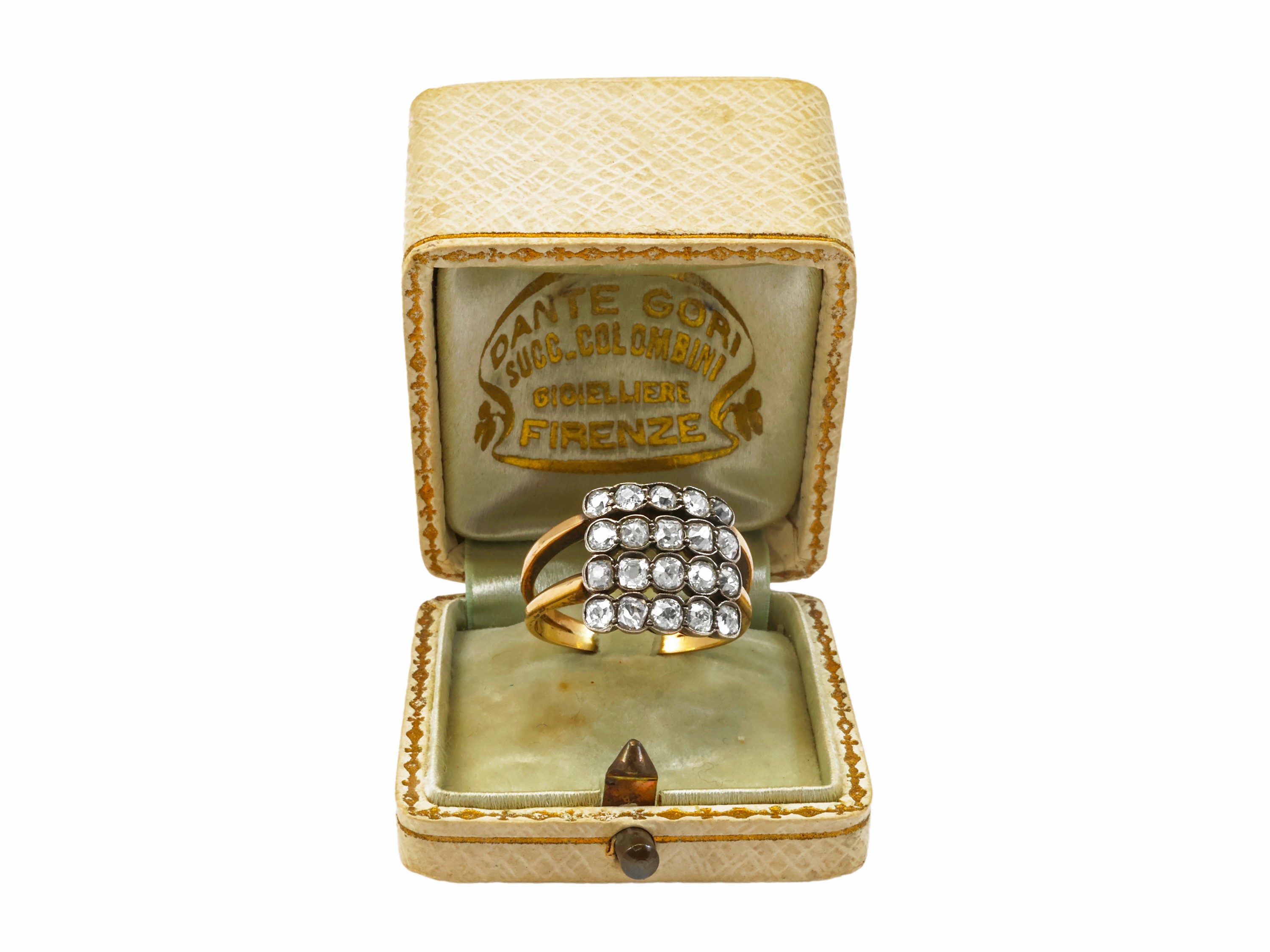 Anello in oro rosso e argento con diamanti