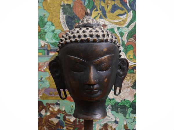 Small bronze Buddha head