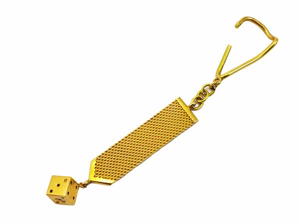 Key ring with nut in 18 kt yellow gold  - Auction Jewels and Watches - Maison Bibelot - Casa d'Aste Firenze - Milano
