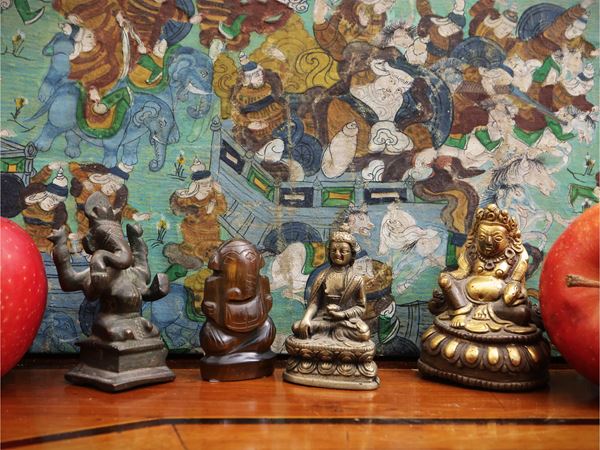 Four small bronze figures