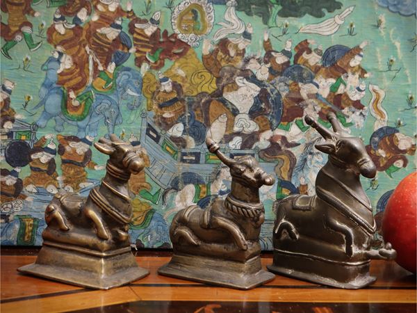 Three small bronze votive figures
